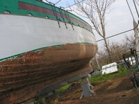 Replacement of two courses of mahogany planking on both sides